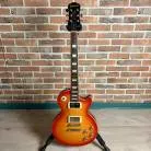 EPIPHONE - LES PAUL TRIBUTE PLUS 1960 HERITAGE CHERRY SUNBURST + ETUI