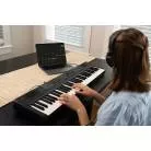 ALESIS - PIANO PORTABLE 61 TOUCHES  HAUT-PARLEURS INTEGRES  STAND  CASQUE  PEDALE SUSTAIN